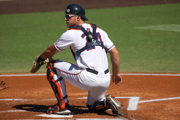 Nate LaRue prepares to receive a throw to home in fall exhibition action against Louisiana Tech